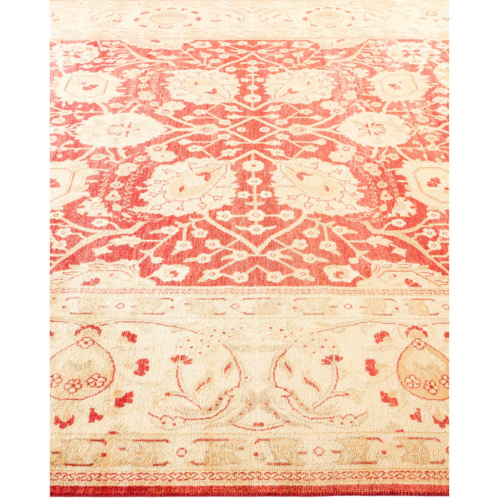 Intricate floral and geometric patterned rug in classic red and off-white.