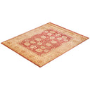 An intricately designed Oriental-inspired carpet with rich red and beige tones.