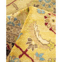 Close-up of a soft, textured, patterned rug with vibrant colors.