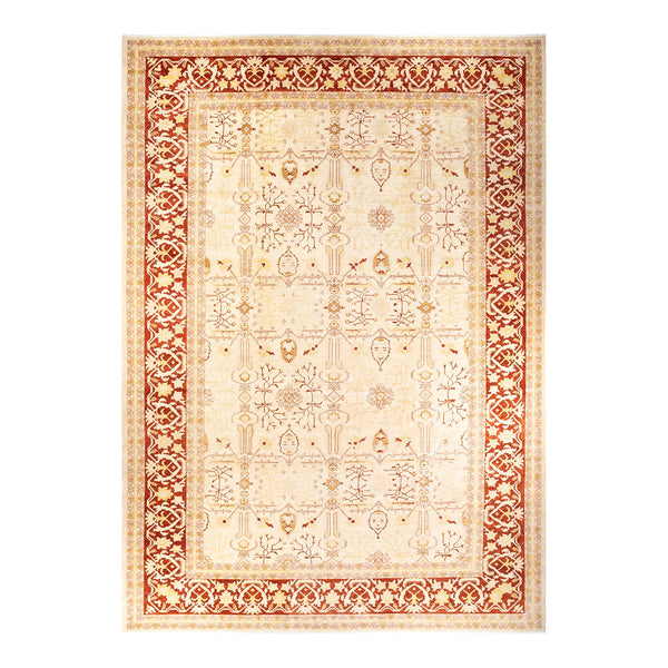 Intricately patterned traditional-style area rug with symmetrical motifs and elegant design.