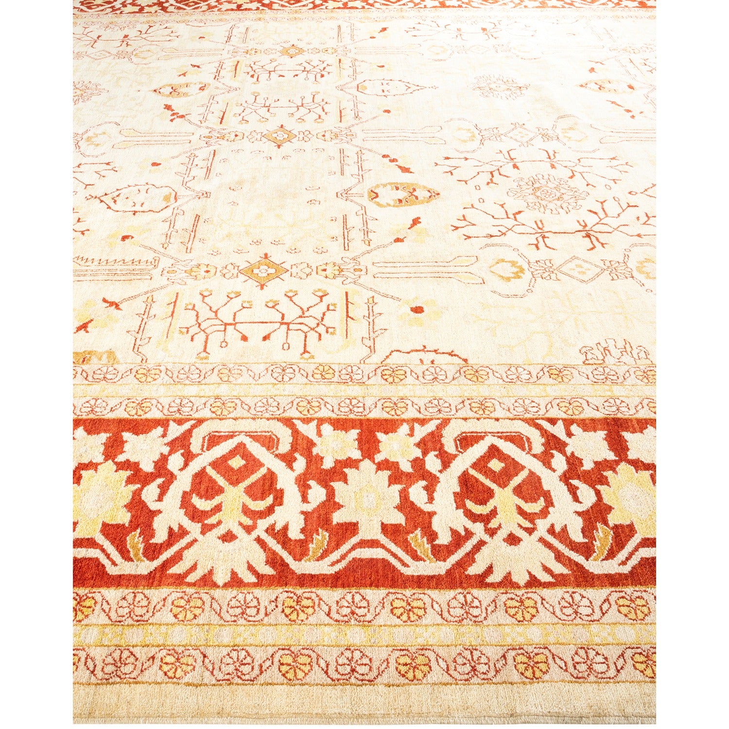 Ornate Persian carpet with intricate floral motifs and warm colors.