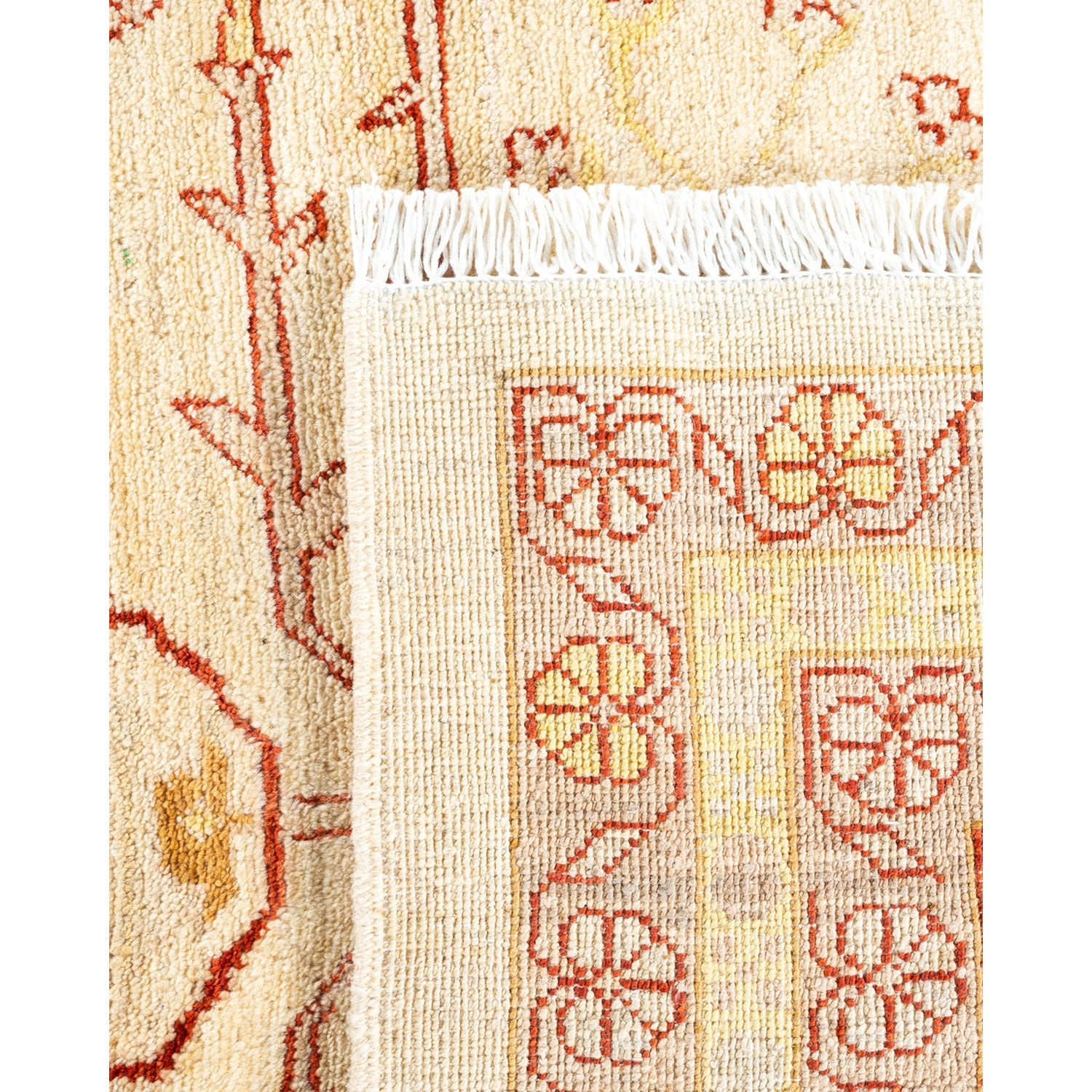 Intricate floral and geometric designs on high-quality handwoven rug.