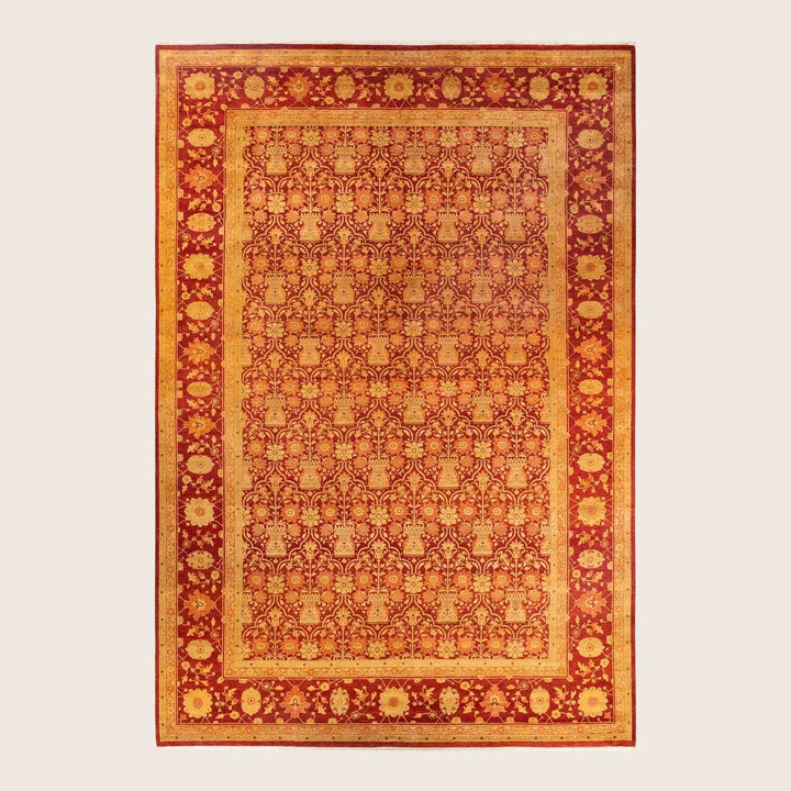 Exquisite hand-knotted oriental rug with intricate design in red and gold.