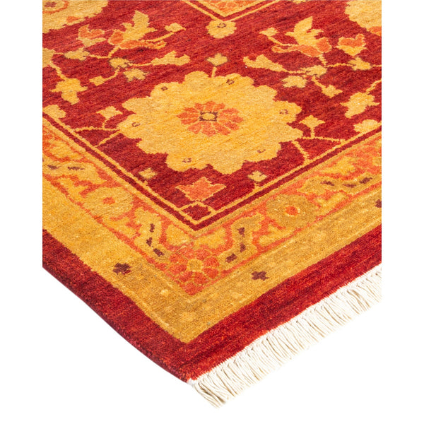 Exquisite handcrafted rug with intricate designs and warm, rich colors.