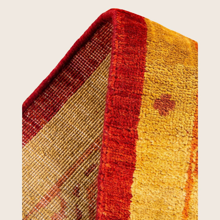 Vibrant and intricate textile showcasing rich colors and detailed patterns.
