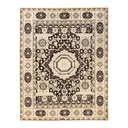 Intricate, symmetrical area rug with geometric and floral motifs.