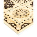 Exquisite handwoven rug showcases intricate Middle Eastern-inspired geometric motifs.