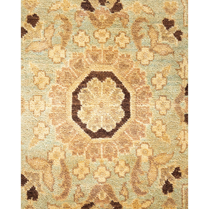 Close-up of a floral patterned rug with intricate design.