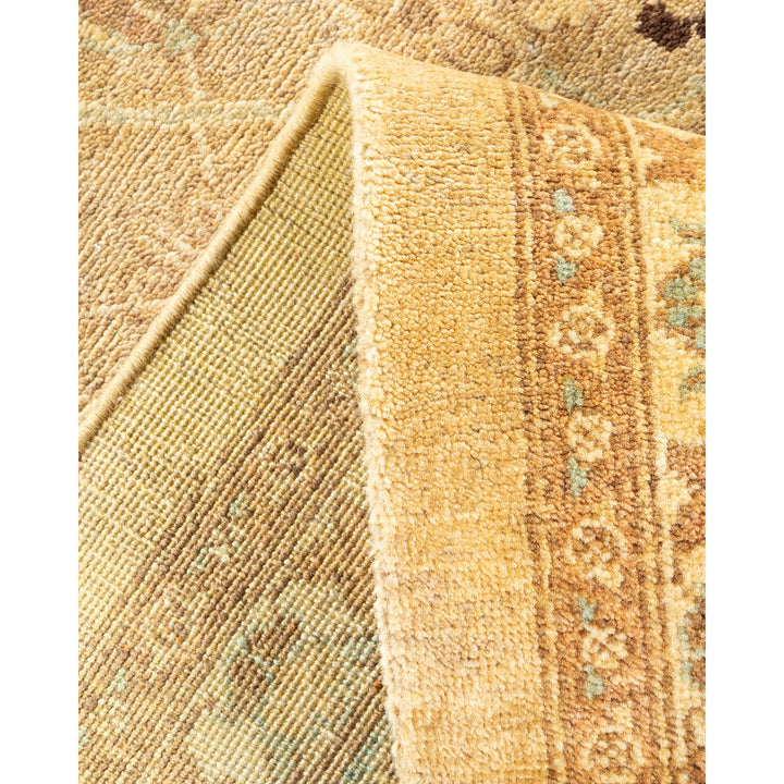 Close-up of a carpet showing intricate and striped designs.