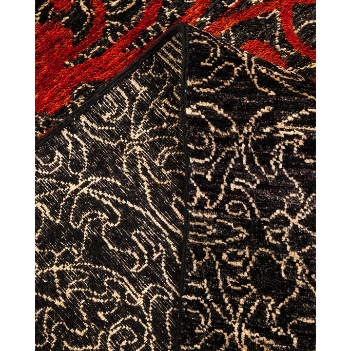 Close-up of a carpet revealing contrasting patterns and textures.