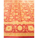 Exquisite handwoven red and gold carpet showcases intricate floral patterns.