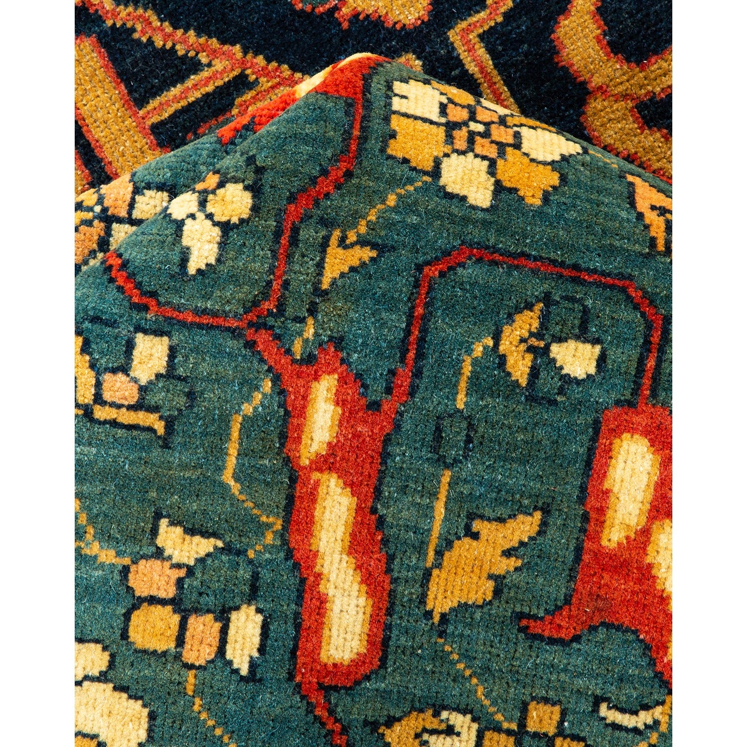 Close-up of a vibrant, intricately woven traditional rug design.