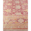 Elegant, hand-woven floral rug with intricate patterns in pink and burgundy hues.