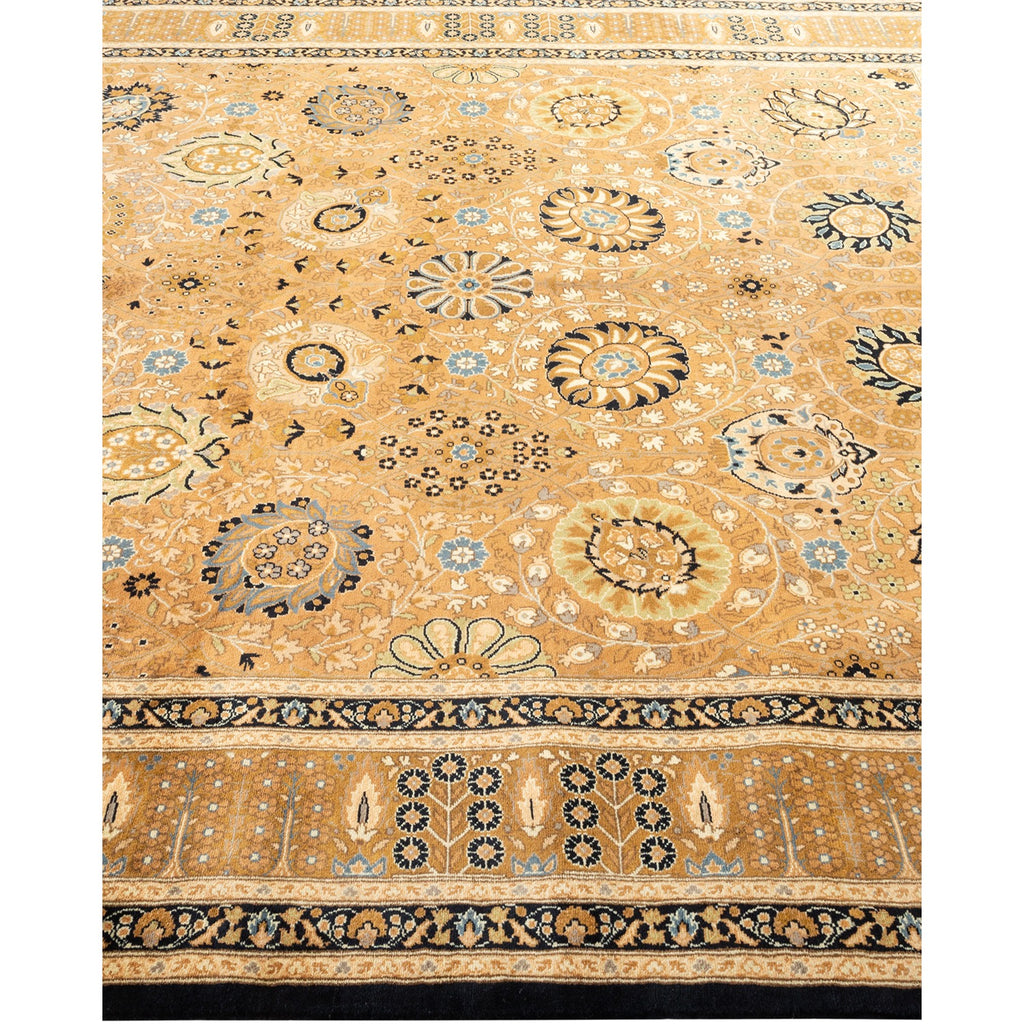 Patterned carpet with golden-tan color scheme, intricate floral and geometric designs.