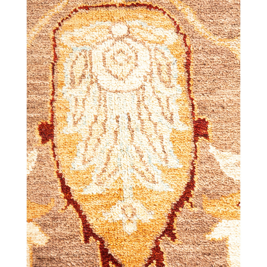 Intricate floral patterned carpet with plush texture and traditional influence.