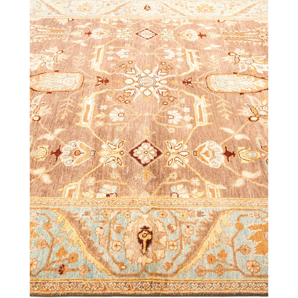 Exquisite vintage-inspired rug with intricate patterns and muted color palette.