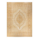 An elegant beige and tan ornate rug with intricate designs.