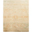 Vintage-inspired rug with muted colors and delicate floral pattern