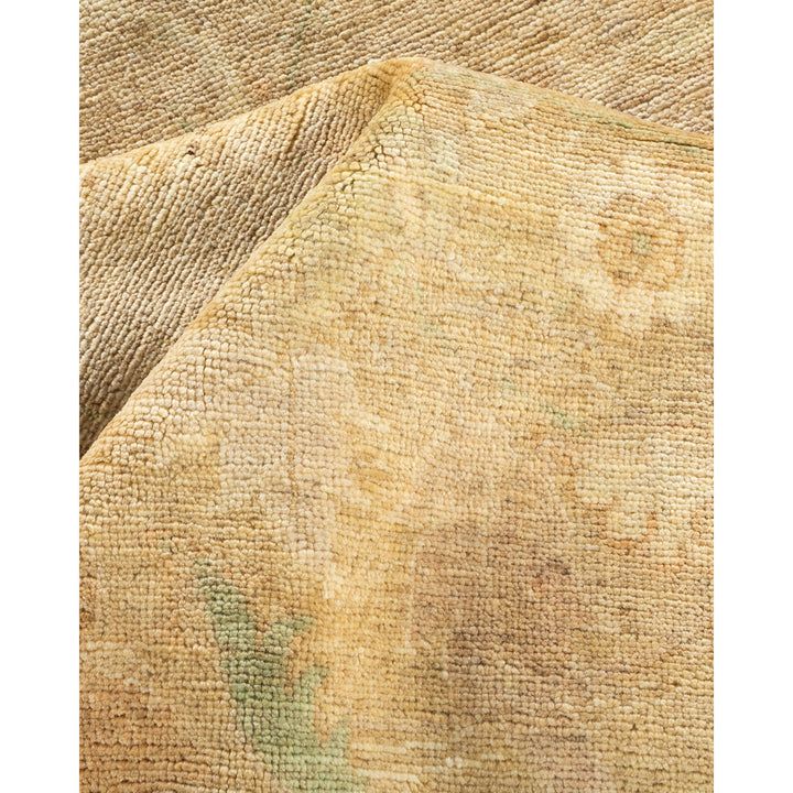 Close-up view of textured fabric with woven pattern in varied tones.