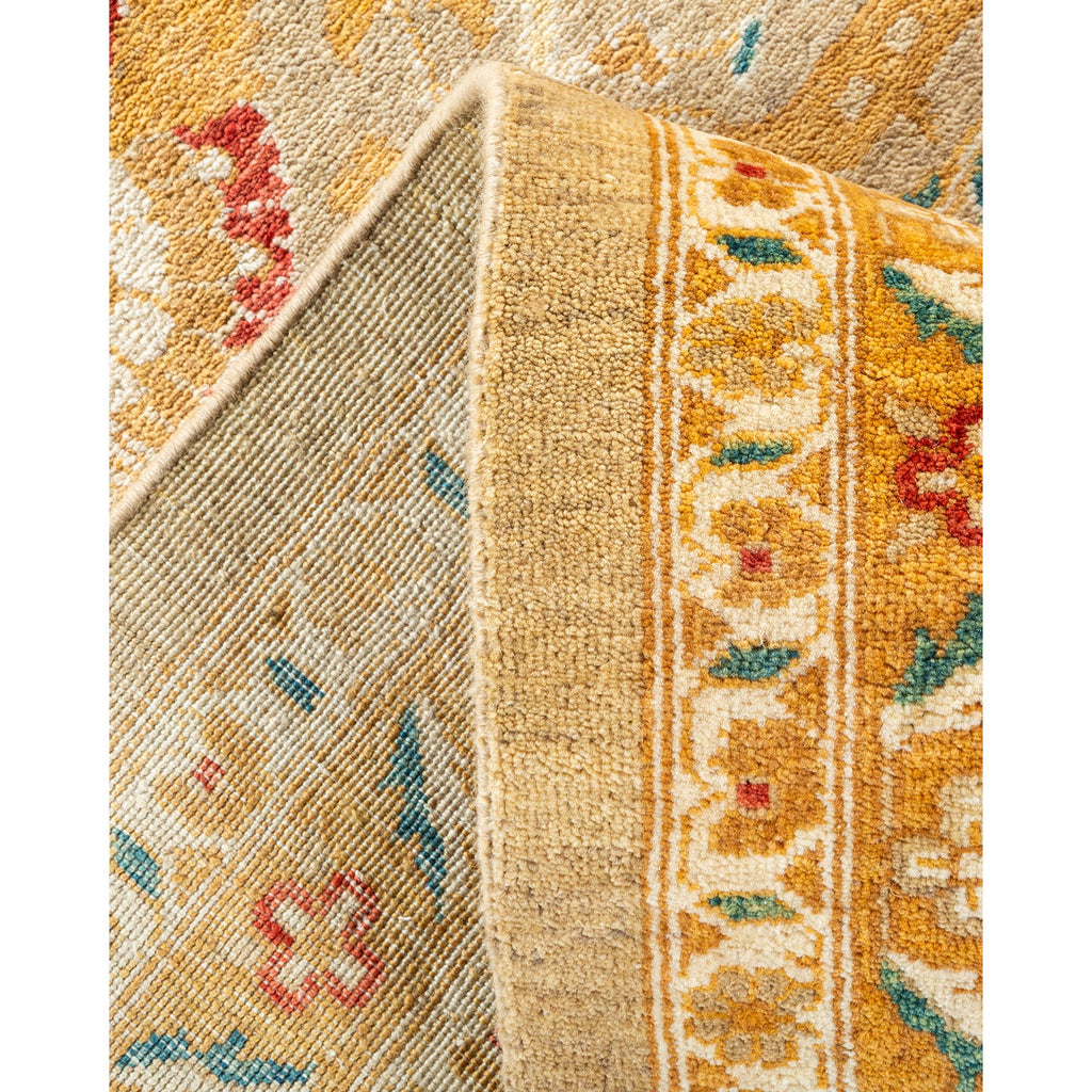 Intricately designed, handwoven rug showcases traditional motifs and vibrant colors.