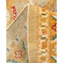 Intricately designed, handwoven rug showcases traditional motifs and vibrant colors.