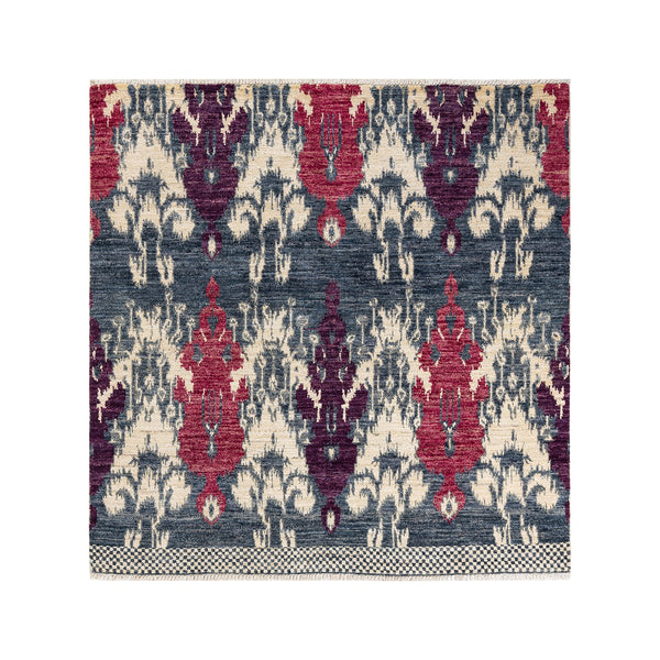 Rectangular area rug with detailed vintage Oriental-inspired motifs in harmonious colors.