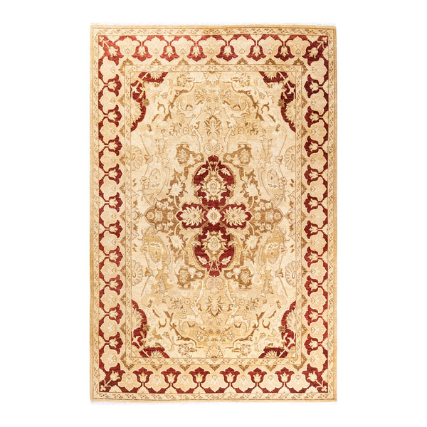 An ornate traditional rug with intricate floral motifs and plush texture.