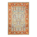 Rectangular area rug showcases intricate floral and geometric motifs.