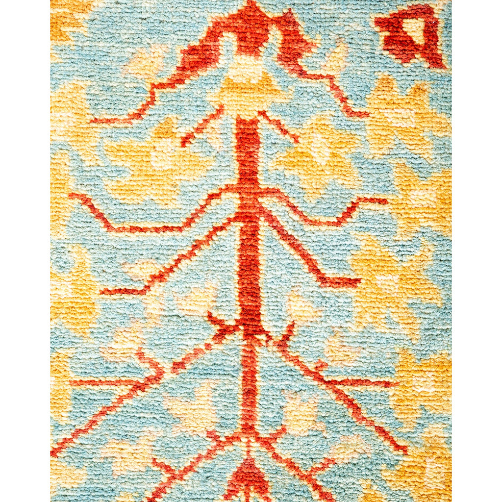 Close-up of a traditional tribal rug with symmetrical geometric design