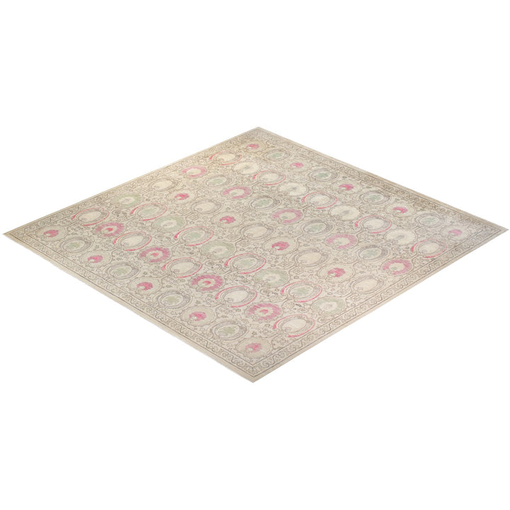 Ornate traditional rug with interconnected floral motifs and intricate border