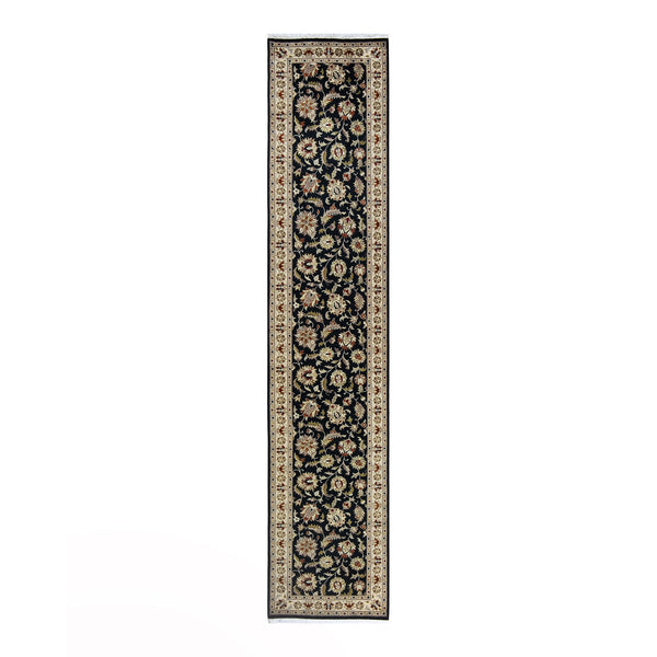 Symmetrical floral runner rug with intricate borders in traditional design.