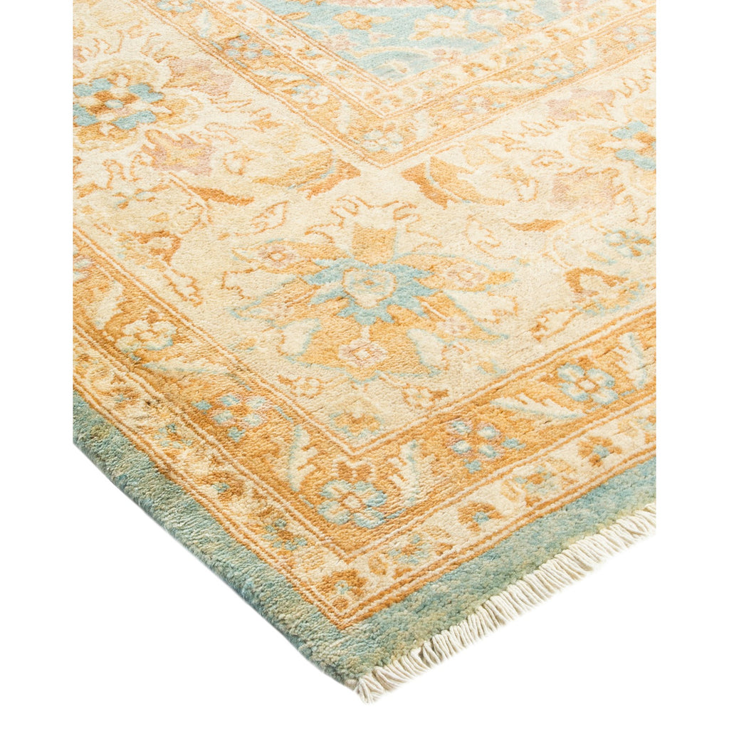 Elegant traditional-style area rug with ornate floral and geometric motif.