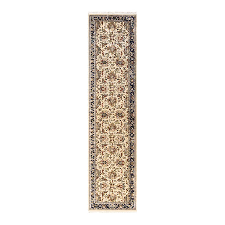 Exquisite ornate rug with intricate patterns and vibrant color accents.