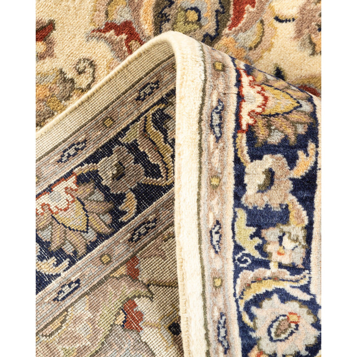 Close-up of a folded Oriental rug showcasing intricate patterns and colors.