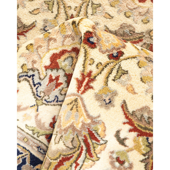 Close-up of a luxurious, intricate patterned carpet showcasing plush texture.