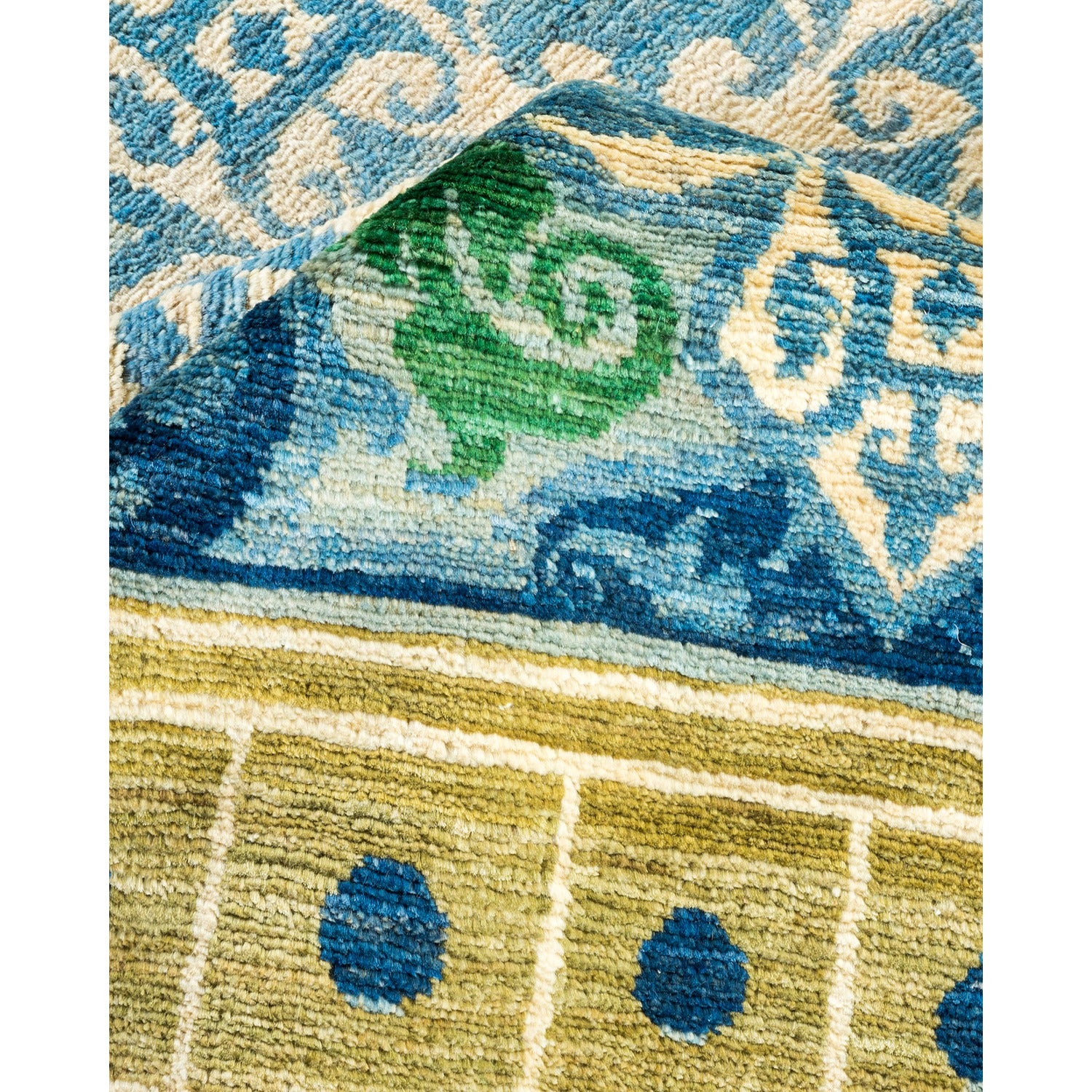 Colorful rug with intricate patterns, inspired by traditional textile arts.