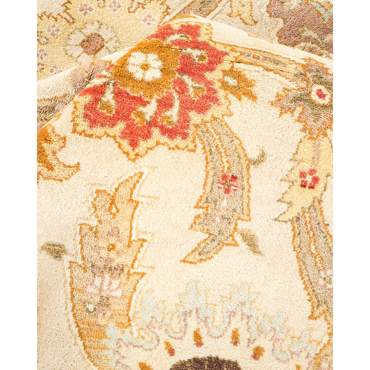 Close-up of a Persian-style carpet displaying intricate floral designs.