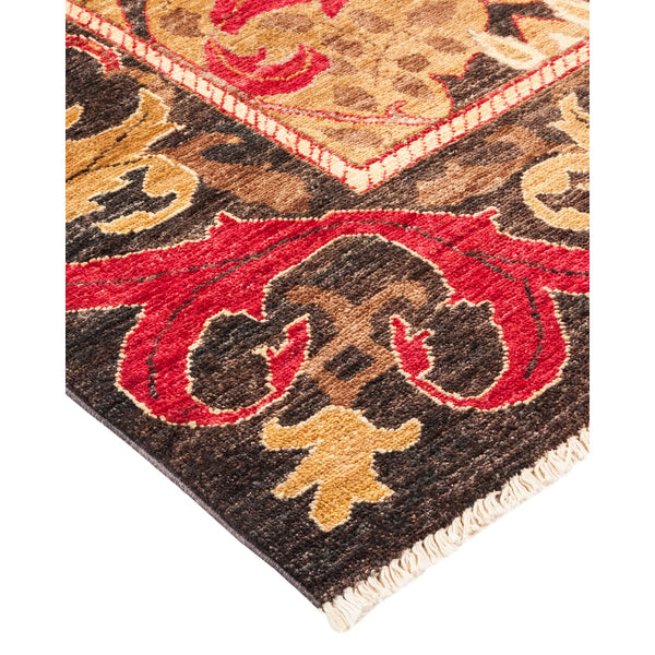 Close-up of a vibrant, intricately designed floral patterned decorative rug.