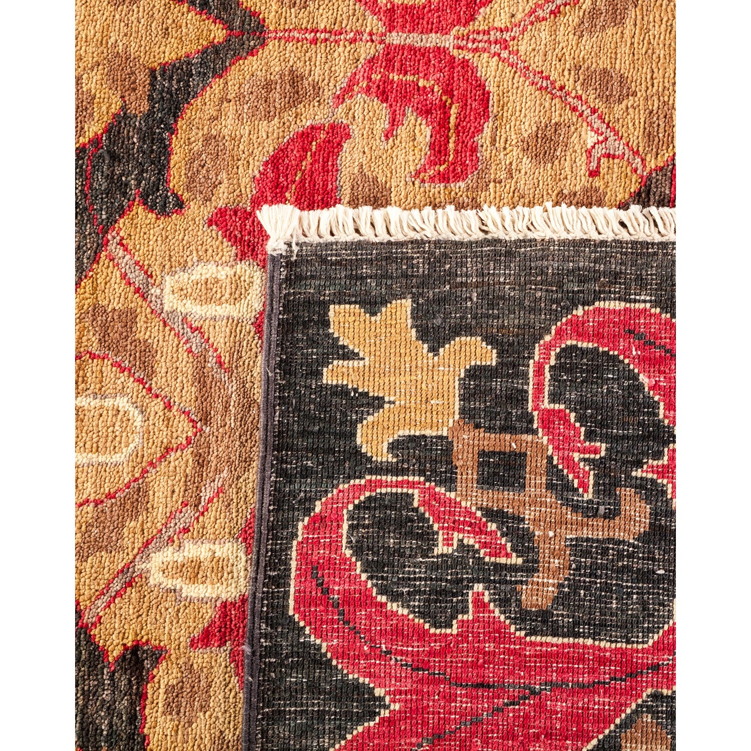 Close-up of a vibrant, handwoven textile with intricate floral patterns