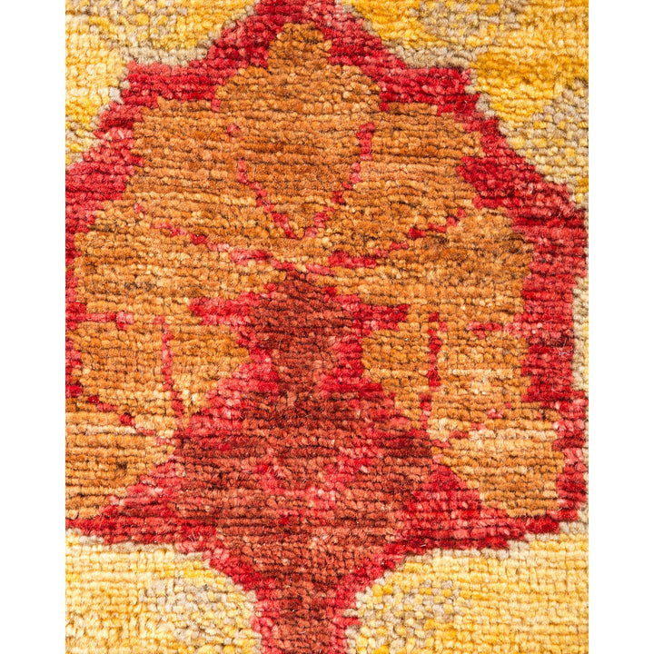 Close-up of a symmetrical and ornate, plush, oriental-style rug.