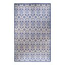 Intricate floral patterned area rug with blue and cream hues.