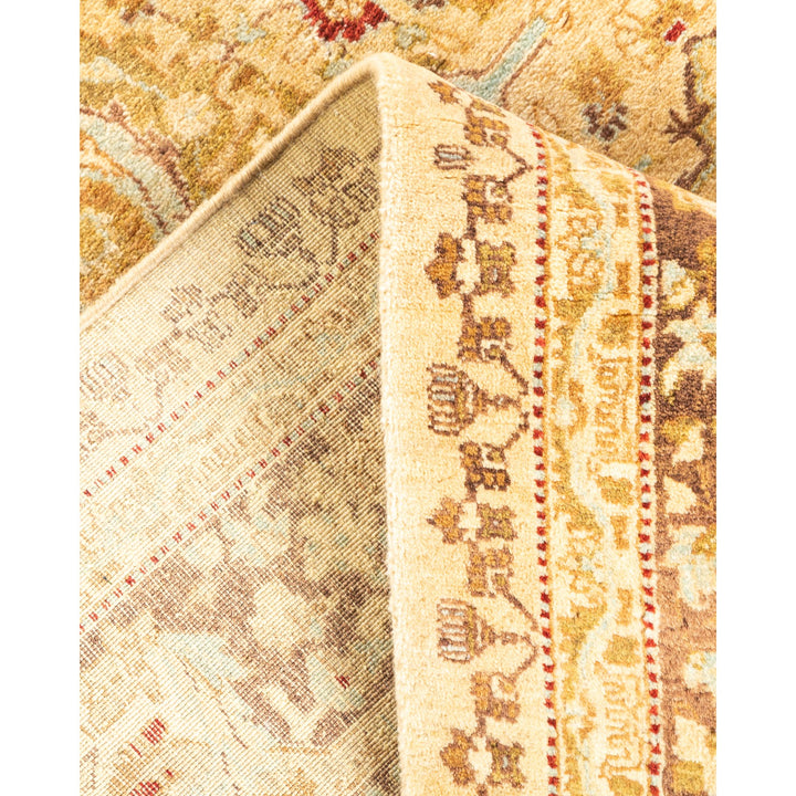 Close-up view of a vintage rug with intricate traditional motifs.