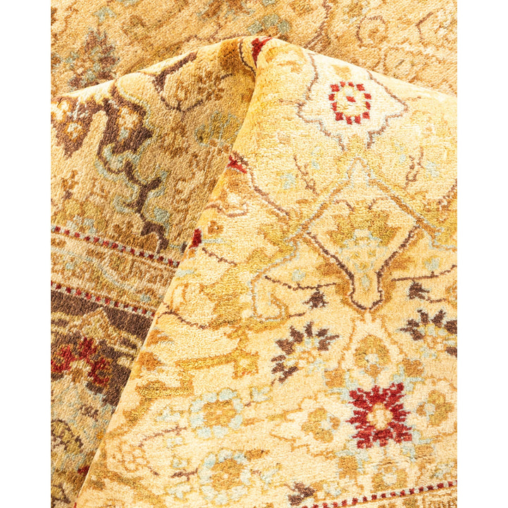 Close-up of an ornate carpet with intricate traditional patterns.