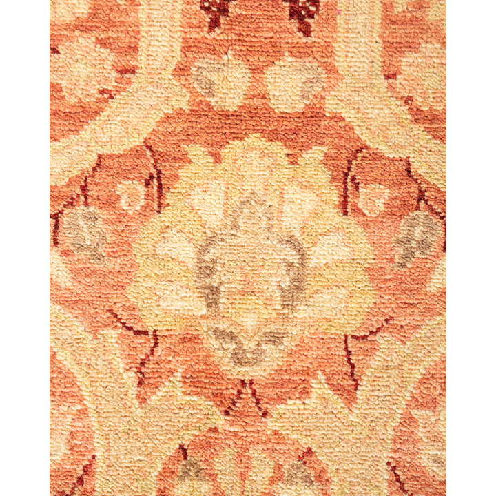Intricate floral and abstract motifs adorn this woven rug.