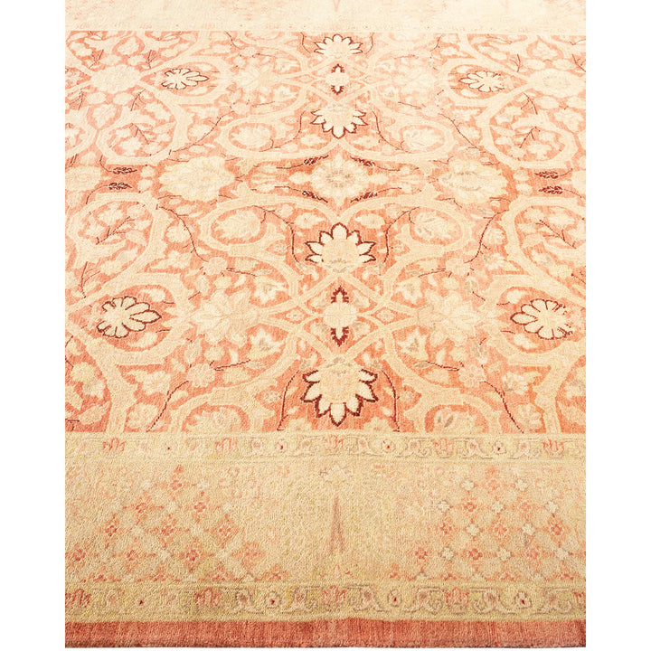 Exquisite traditional carpet with muted pink and beige floral design.