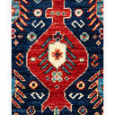 Intricate oriental rug showcases exquisite craftsmanship with vibrant, detailed motifs.