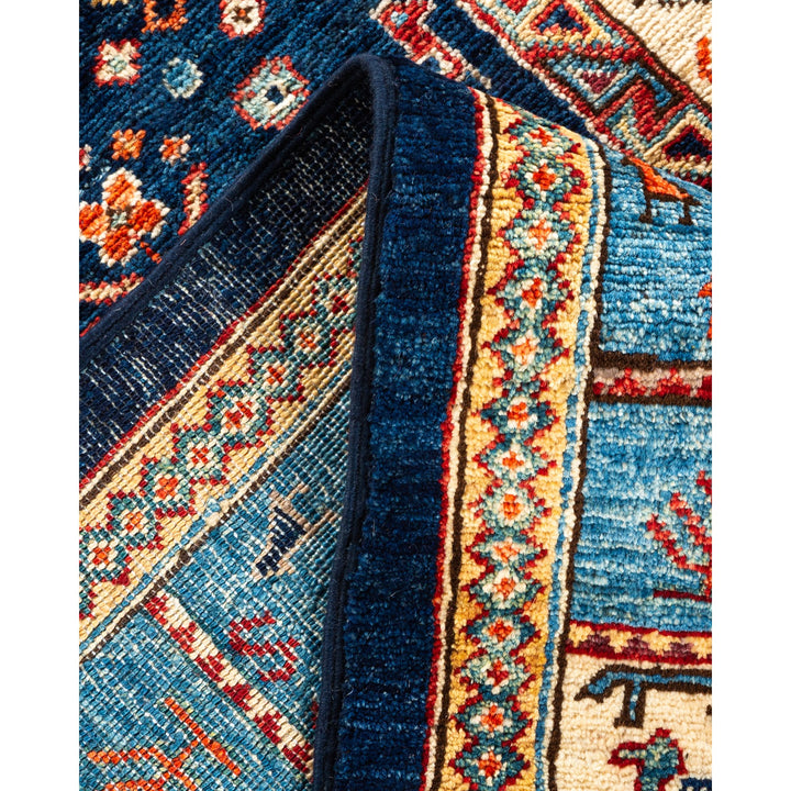 Intricately designed traditional woven rug showcasing vibrant colors and tight weave.