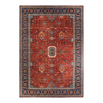 An ornate rectangular area rug with intricate patterns and borders.