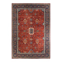 An ornate rectangular area rug with intricate patterns and borders.