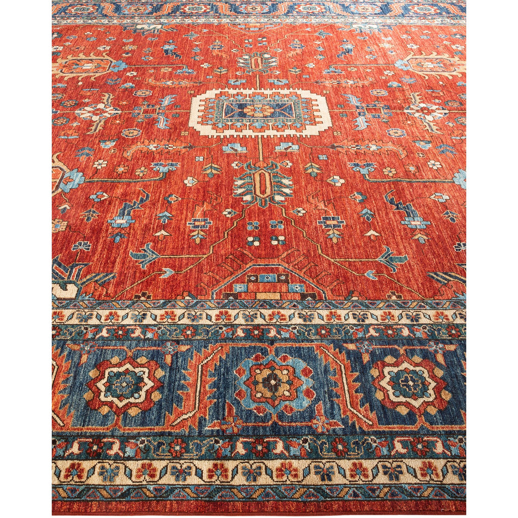 Richly colored Oriental rug with intricate geometric and floral motifs